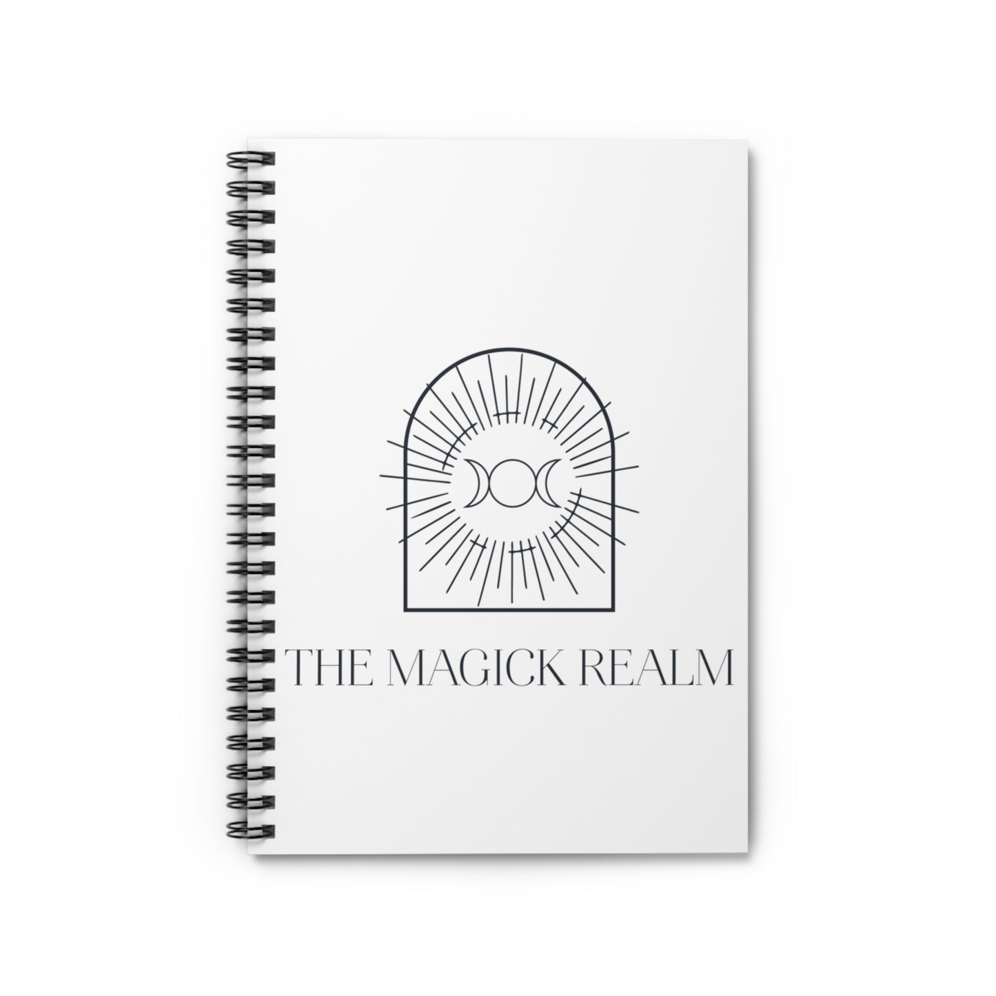 Notebook titled 'The Magick Realm' with a black and white design on a white background
