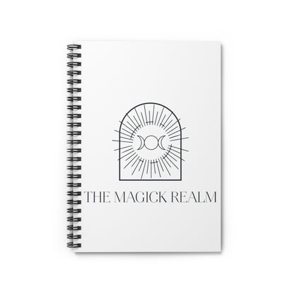 Notebook titled 'The Magick Realm' with a black and white design on a white background