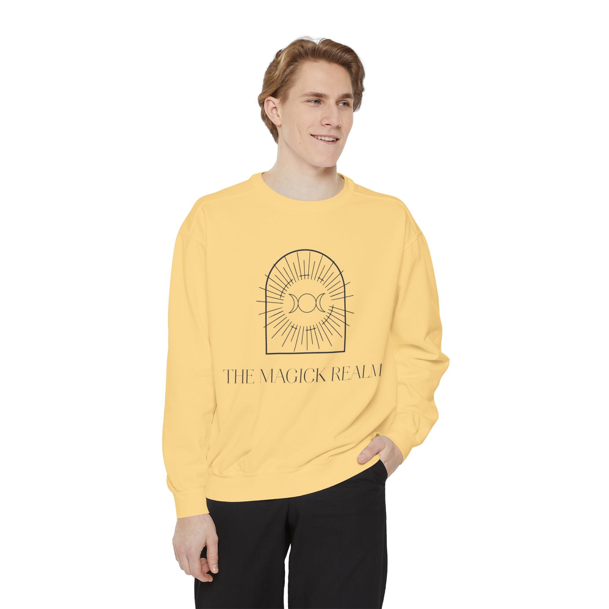 Person wearing a yellow sweatshirt with a logo and text on a white background