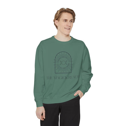 Person wearing a green sweatshirt with a design and text on a white background