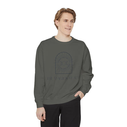 Man wearing a gray sweatshirt with a logo and text on a white background
