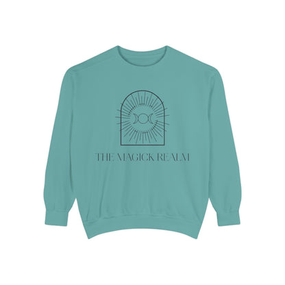 Teal sweatshirt with a graphic design and text on a white background