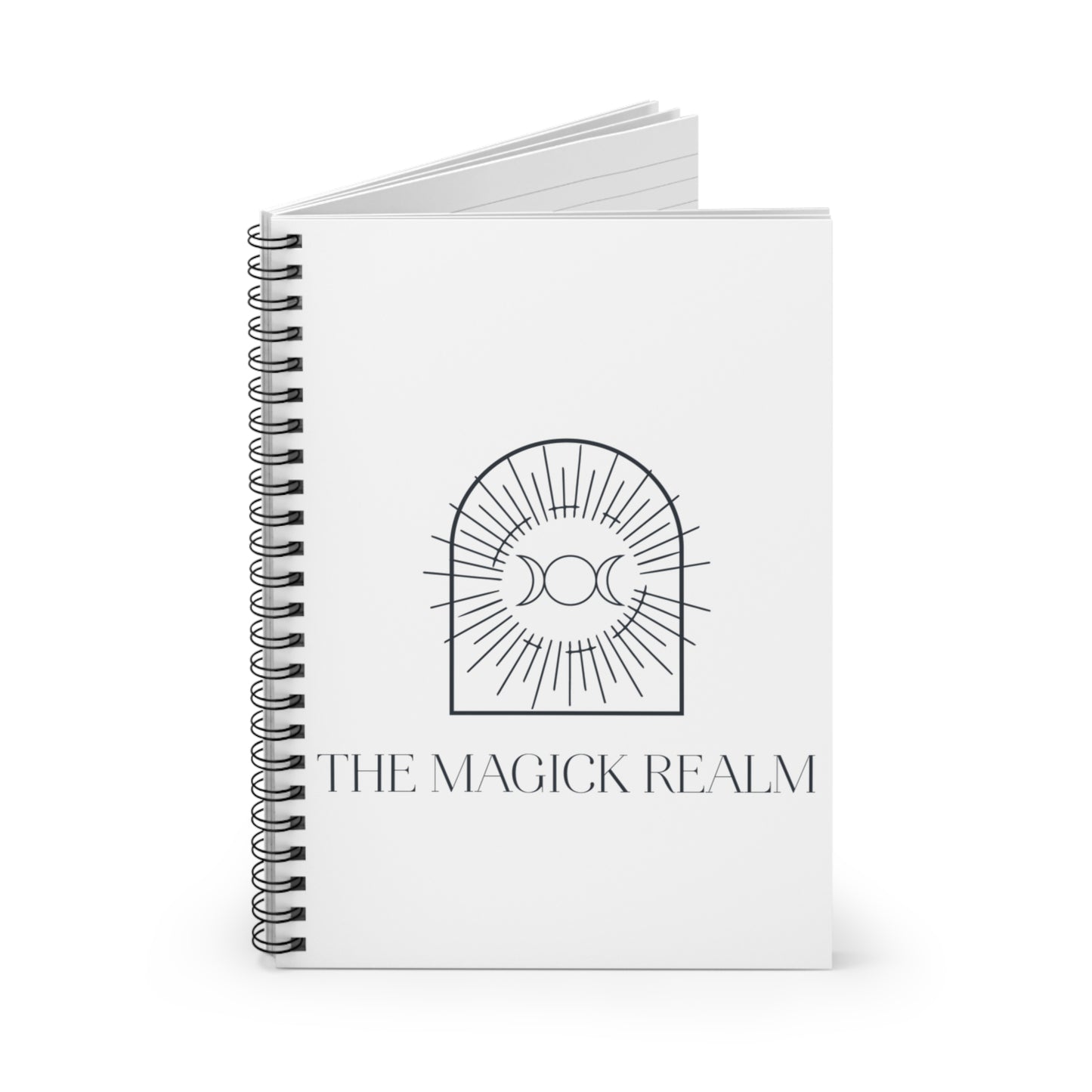 Notebook titled 'The Magick Realm' with a design on the cover against a white background