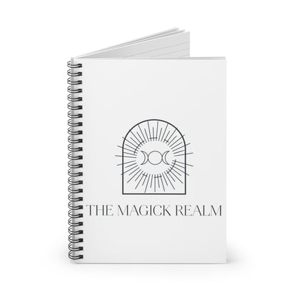 Notebook titled 'The Magick Realm' with a design on the cover against a white background