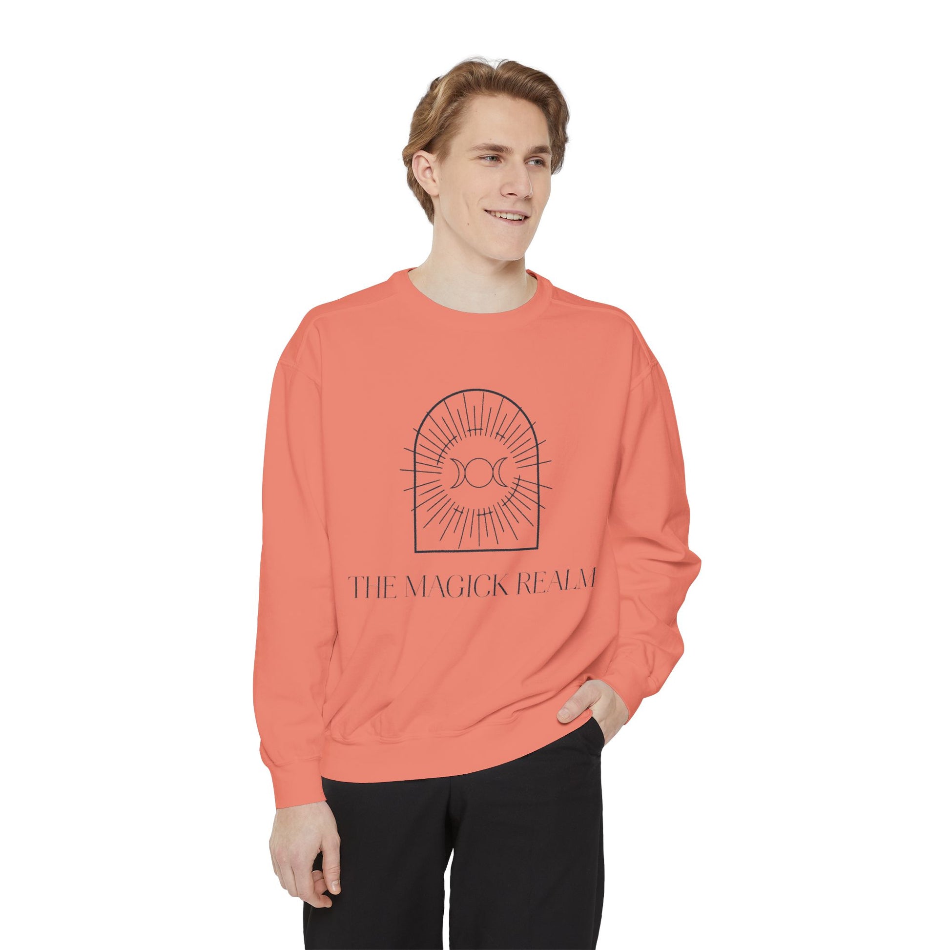 Person wearing a coral sweatshirt with a graphic design and text on a white background