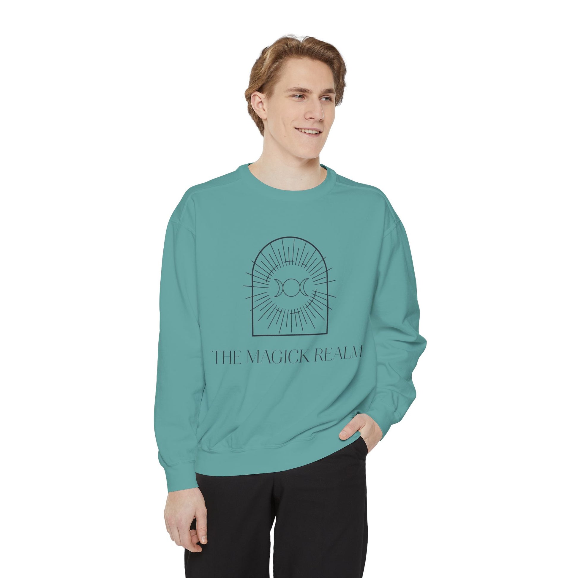 Person wearing a teal sweatshirt with a graphic design and text on a white background