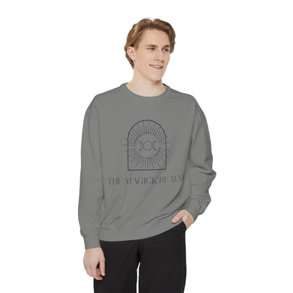 Person wearing a gray sweatshirt with a design and text on a white background
