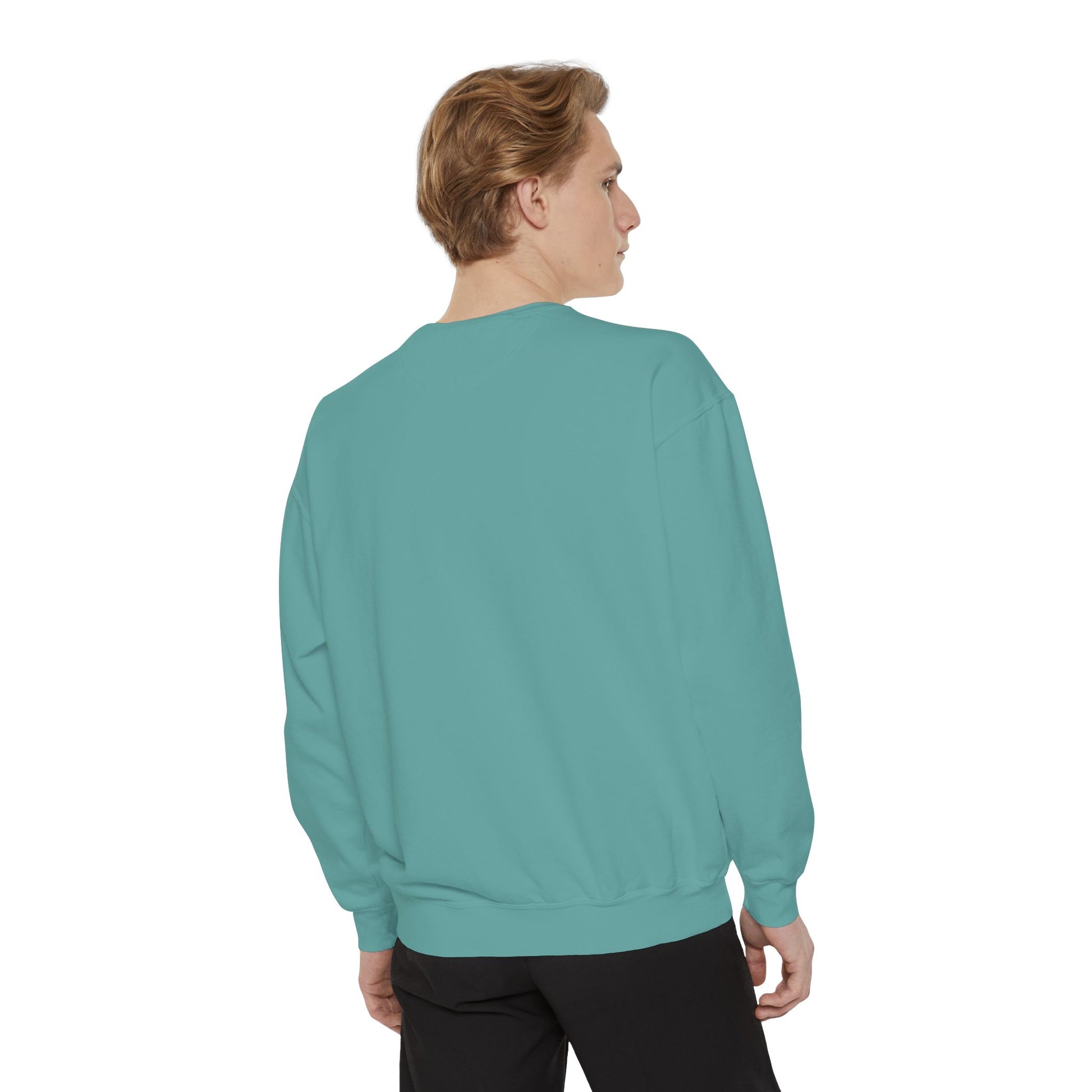 Person wearing a teal sweatshirt on a white background